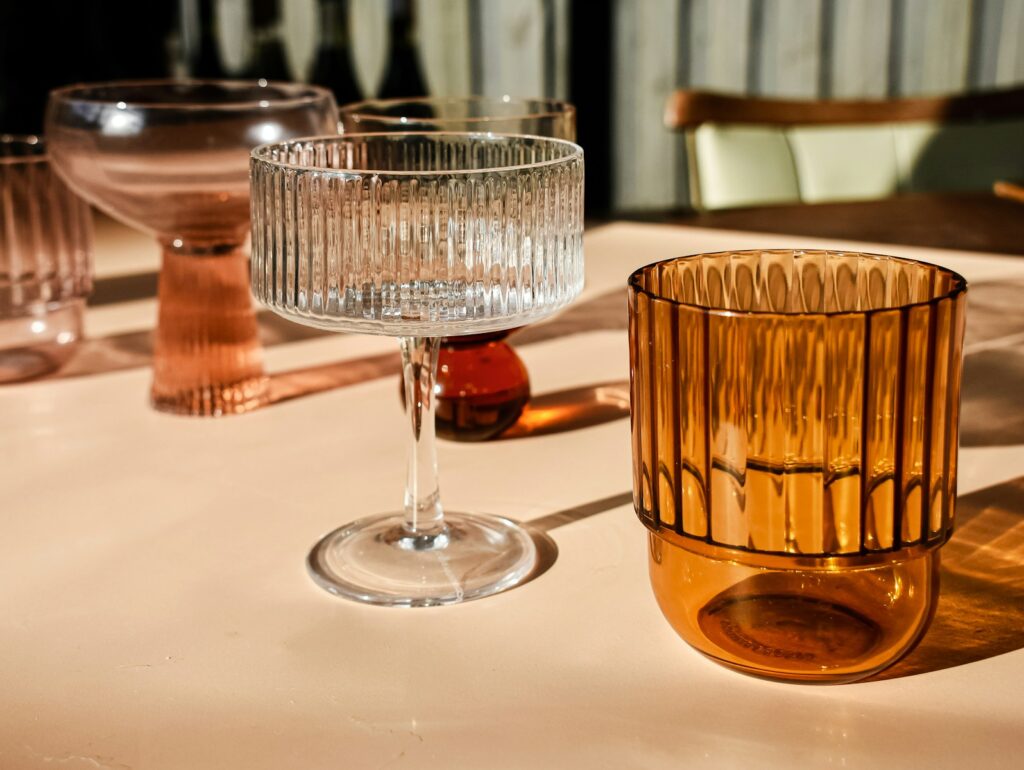 a close up of a glass on a table