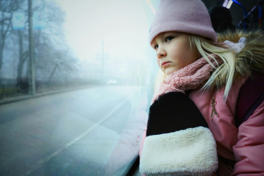 a woman wearing a pink hat