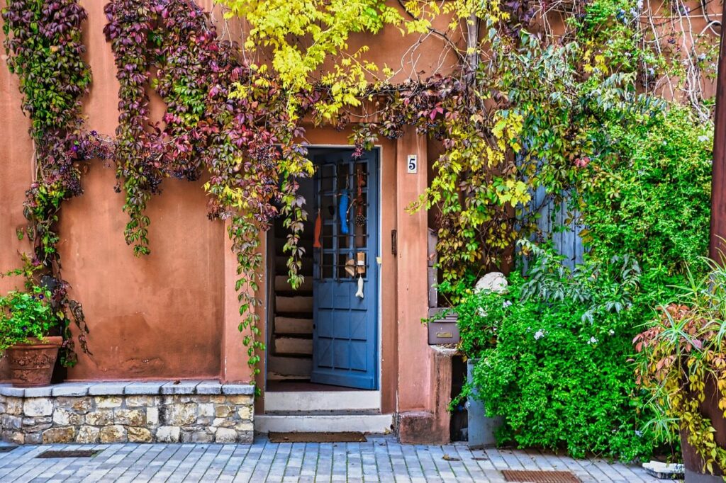 door, building, vegetation, facade, house, town, street, building, house, house, house, house, house
