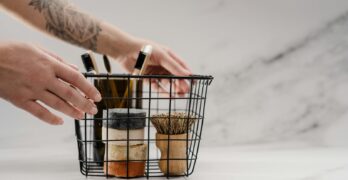 Discover zero waste bathroom essentials in a wire basket for eco-friendly living.