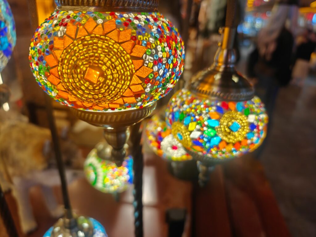 A group of colorful lights hanging from a ceiling
