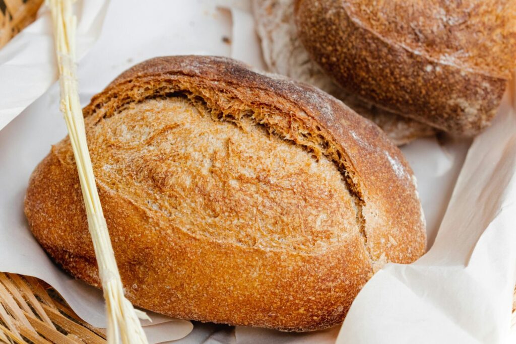 Rustic artisan bread with a crusty texture, perfect for food presentations.