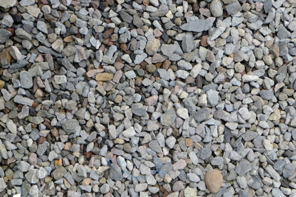 A pile of small, gray and tan gravel stones.