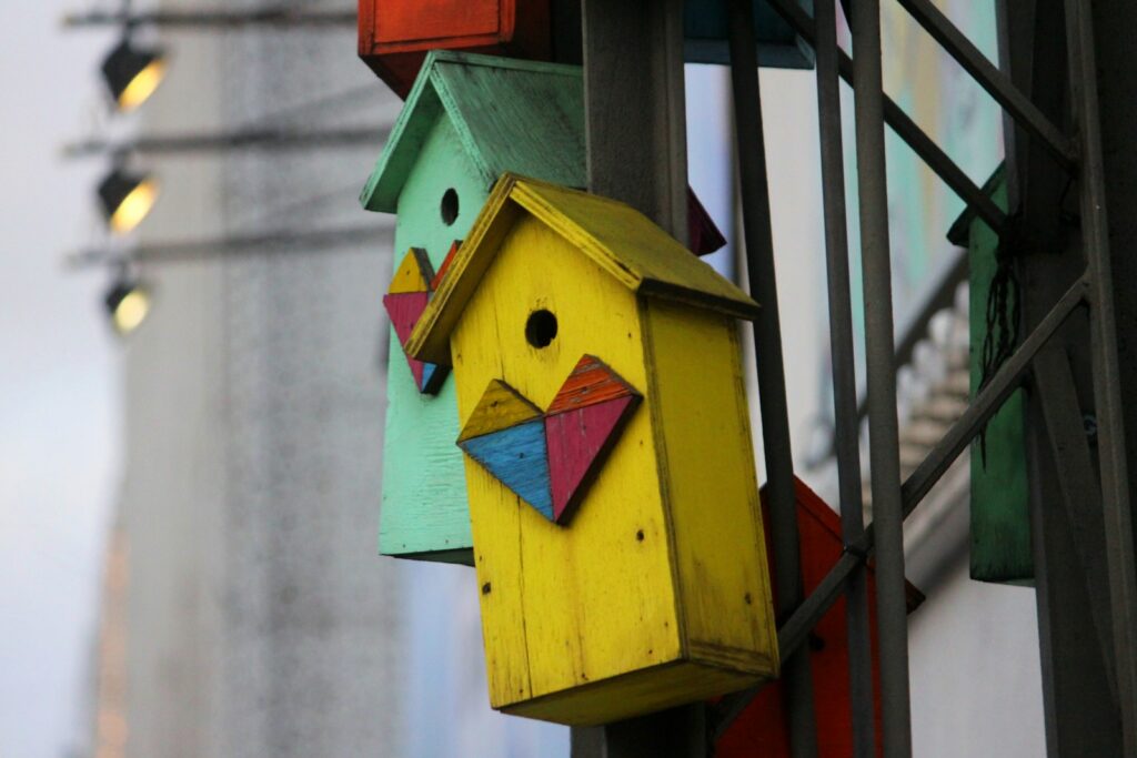 a birdhouse on a pole