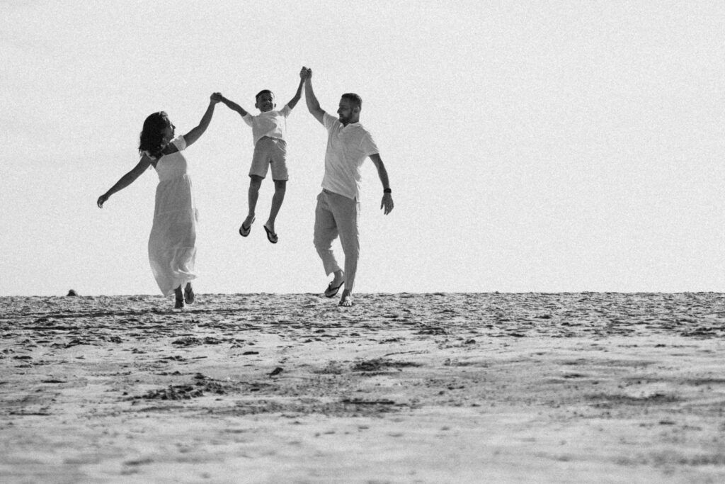 a couple of people that are jumping in the air