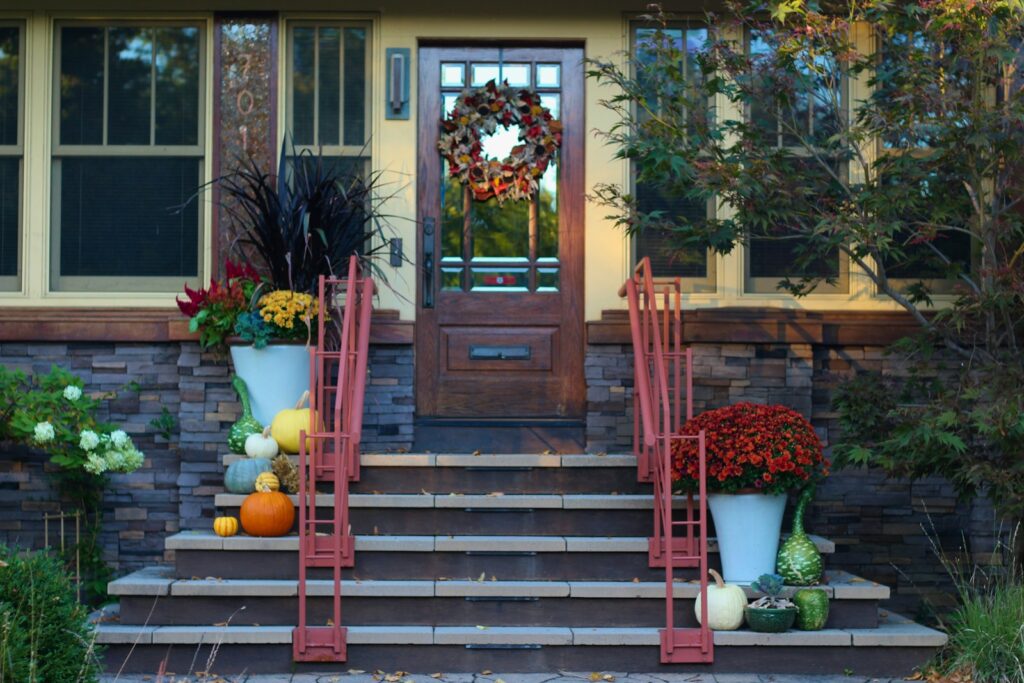 A couple of red chairs sitting on top of a set of steps