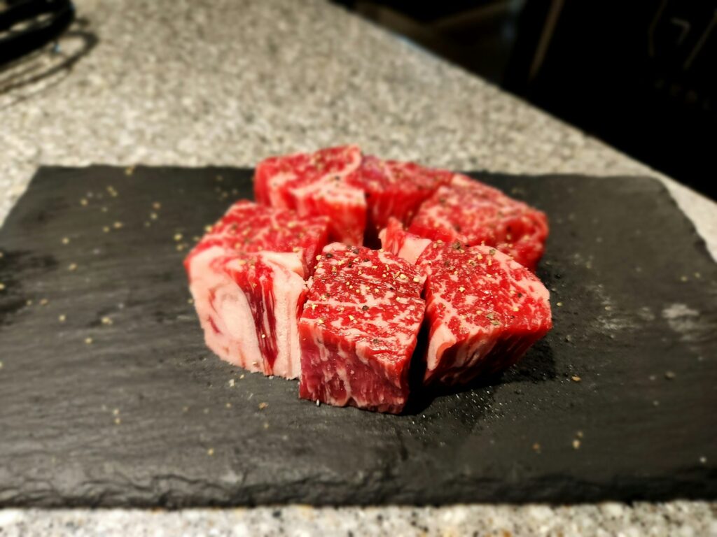 a piece of raw meat on a cutting board