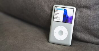 an ipod sitting on top of a couch