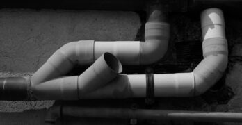 A black and white photo of a pipe