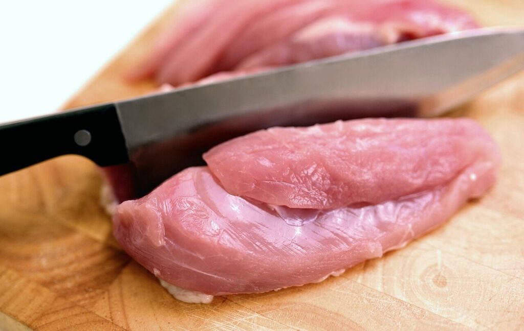 meat, knife, poultry, food, raw, chicken meat, chop, cut, raw meat, raw food, meat, chicken meat, chicken meat, chicken meat, chicken meat, chicken meat