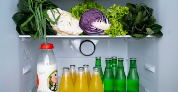 A refrigerator filled with lots of food and drinks