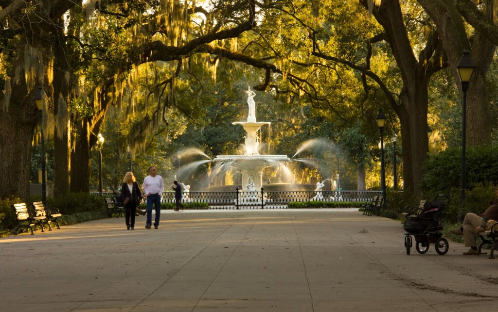 people standing near fountain during daytime