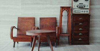 brown wooden chairs, table, and cabinet
