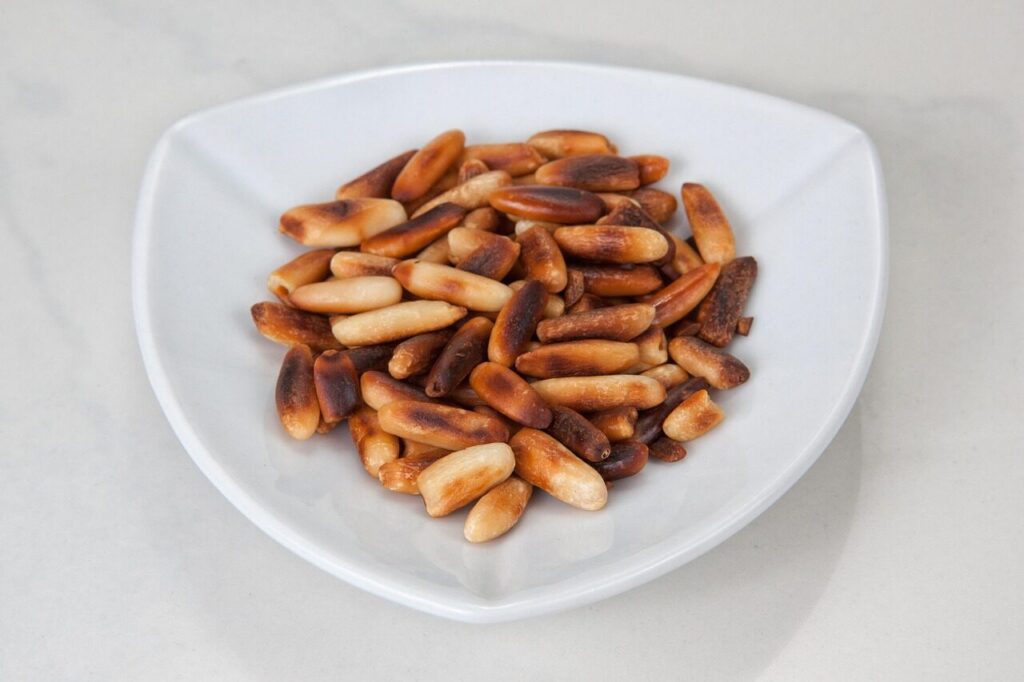 pine nuts, roasted, roasted pine nuts, pine trees, ingredients, cook, preparation, ingredient, food, pine nut, pine nuts, pine nuts, pine nuts, pine nuts, pine nuts, pine nut, pine nut, pine nut