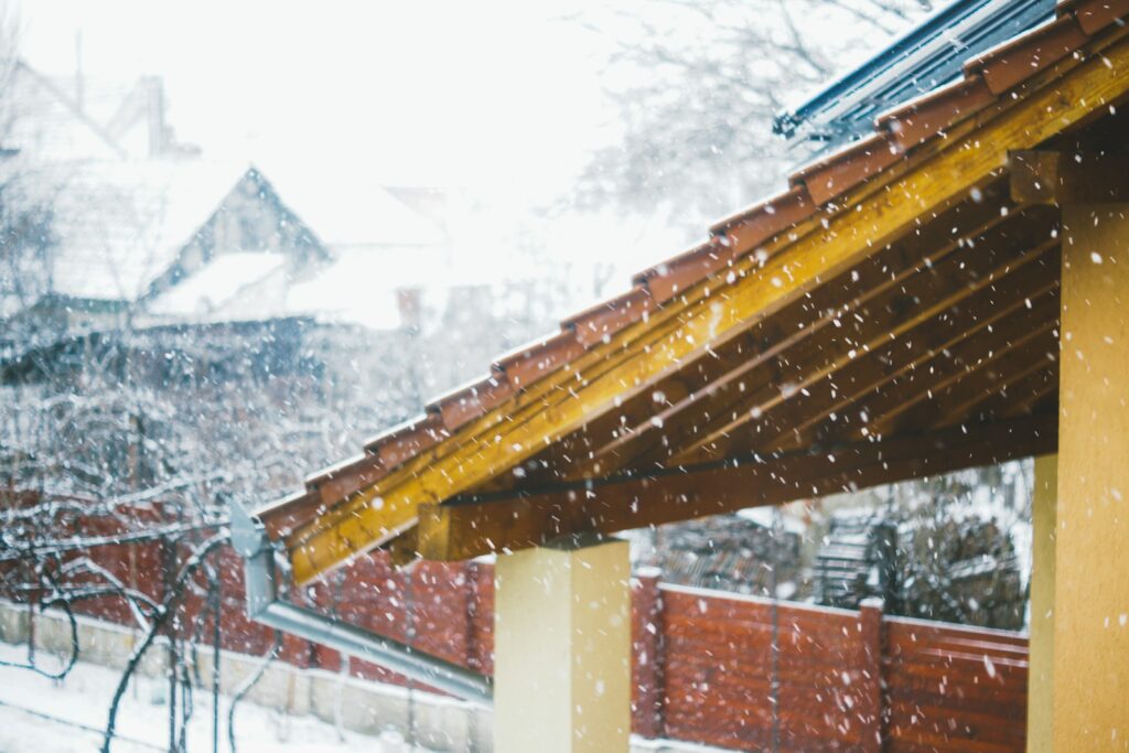 view of house roof during winter