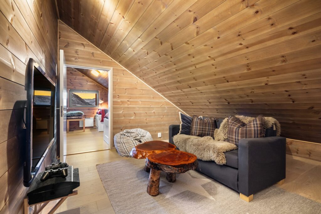 A living room filled with furniture and a flat screen TV