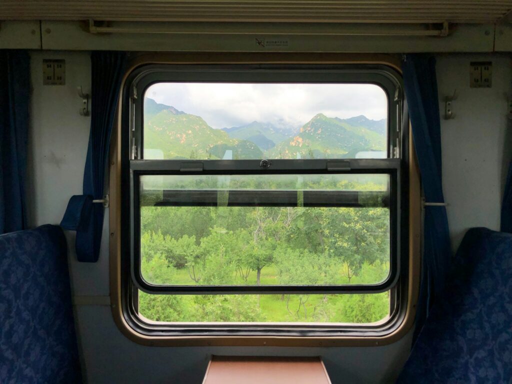 A train car with a table in the middle of it