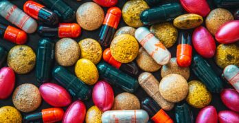 red and brown medication pill