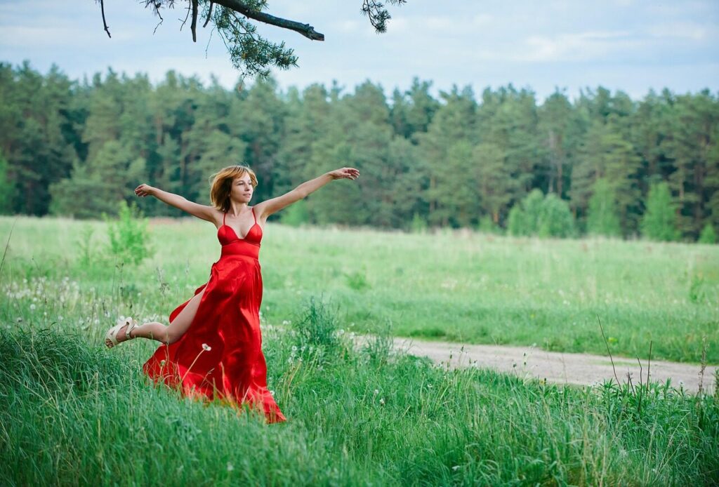 woman, model, red dress, dress, fashion, go over, jumping, long dress, style, stylish woman, young woman, women, fields, grass, meadow, landscape, nature, outdoors, joy, happiness, emotions, euphoria, jump for happiness, to be in the clouds, dream, women, euphoria, euphoria, euphoria, euphoria, euphoria