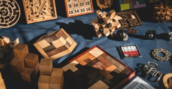 brown wooden blocks on blue textile