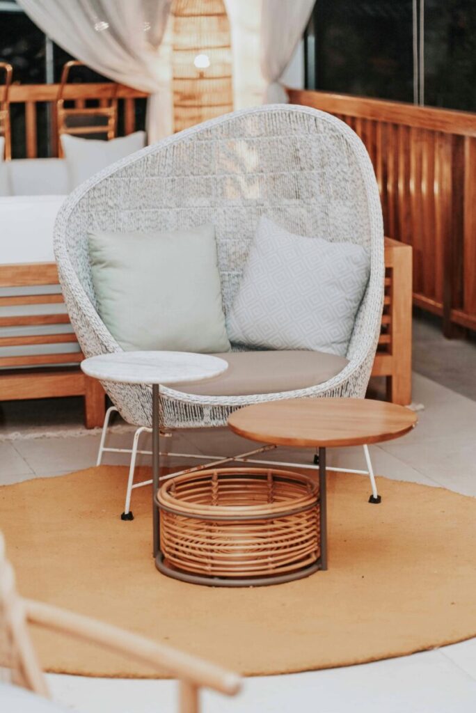 A stylish terrace with wicker furniture, perfect for relaxation and modern decor.