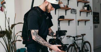 a man holding a camera in his hands