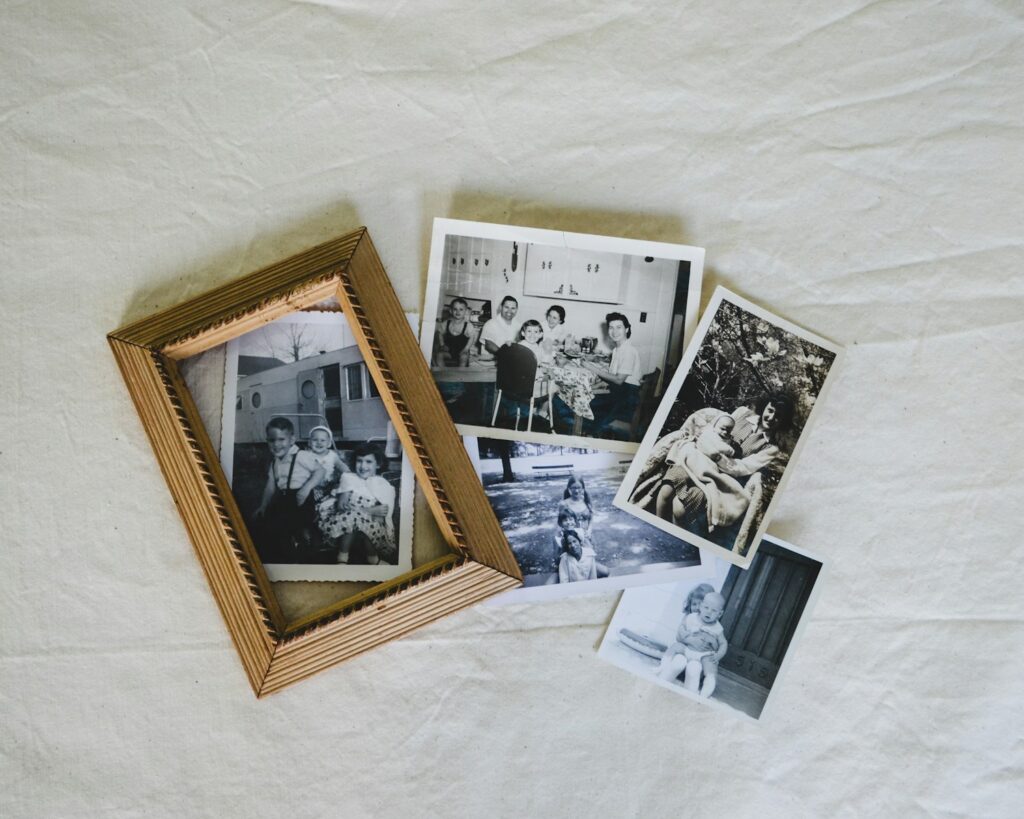 A group of photos sitting on top of a white sheet