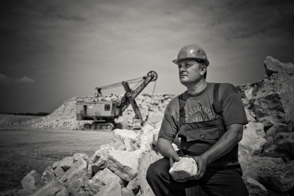 adult, construction, hard hat, man, mine, outdoors, rocks, uniform, vehicle, wear, work, worker, gray work, gray construction, gray rock, construction, hard hat, mine, mine, mine, mine, mine, worker