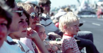 people beside race track