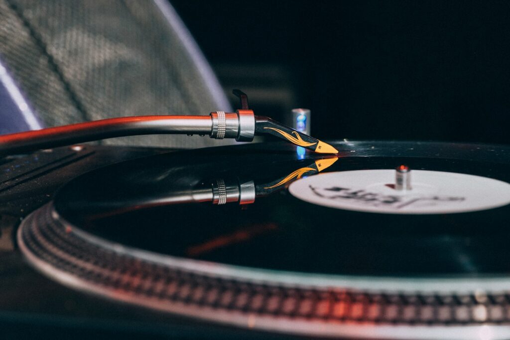 black vinyl record in turntable
