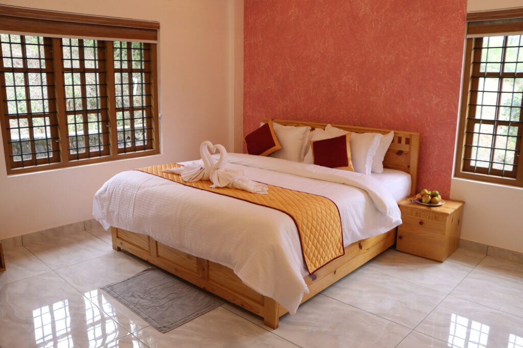 A beautifully decorated bedroom with a cozy bed.