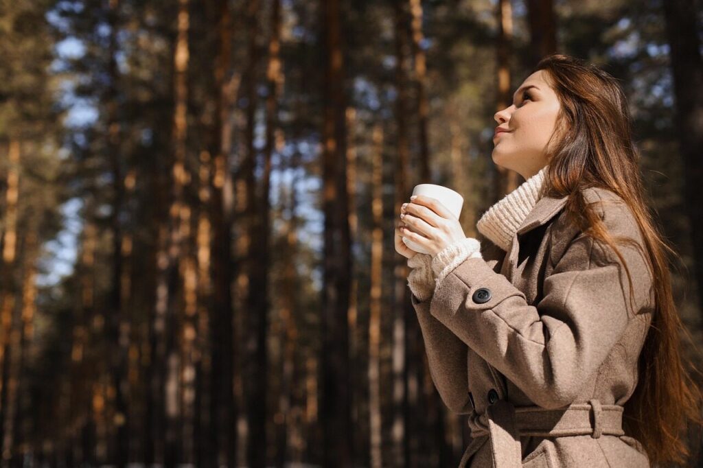 woman, beauty, fashion, nature, portrait, drink, outdoors, beverage, coat, coffee, female, forest, girl