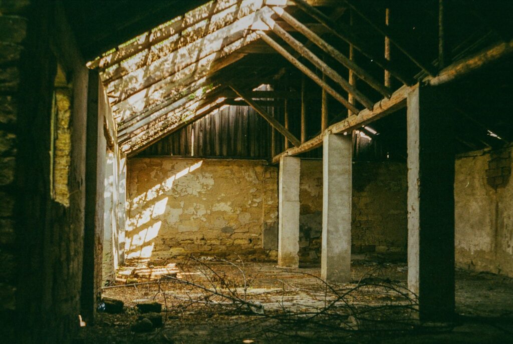 brown brick wall with brown wooden door