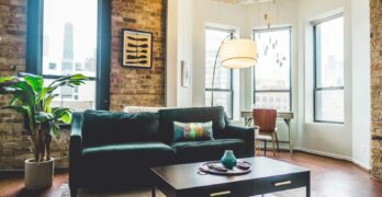 Contemporary living room with elegant decor and cozy furniture in urban setting.