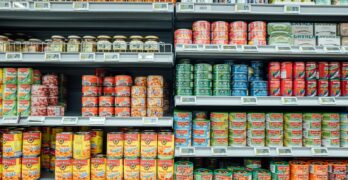 white and red labeled plastic containers
