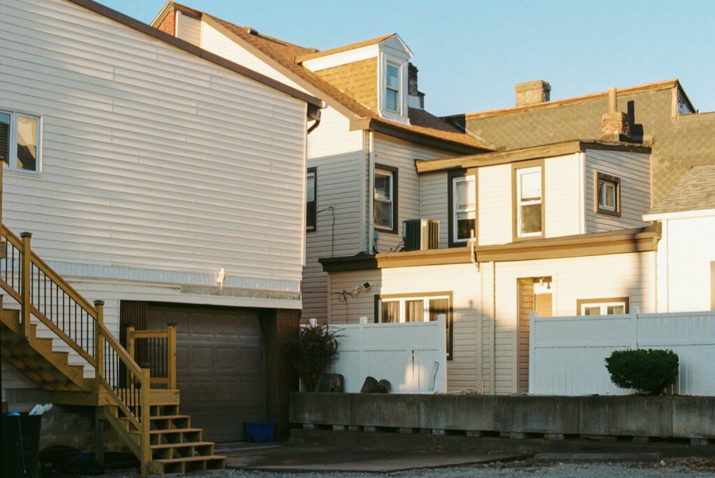 A row of houses with a fire hydrant in front of them