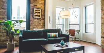 Contemporary living room with elegant decor and cozy furniture in urban setting.