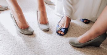 woman in white dress and black leather flats