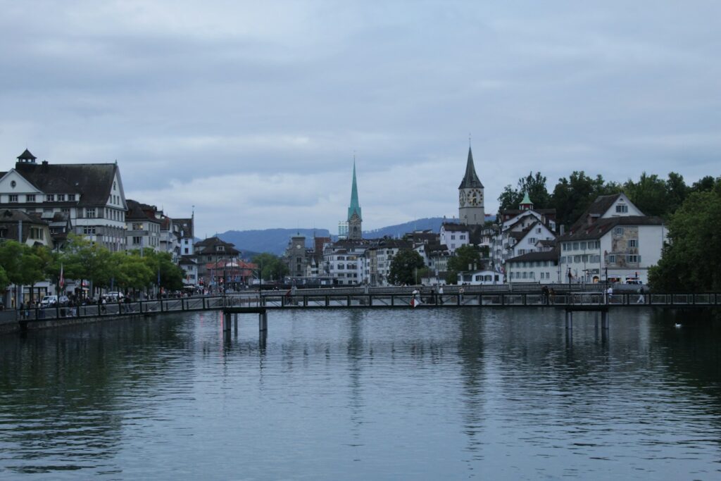 Cityscape of zurich reflected in the water.